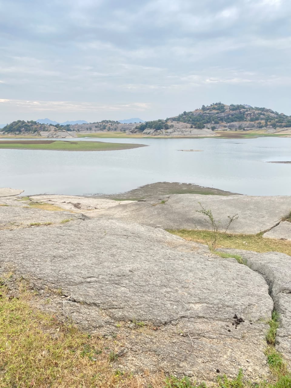 The vast Jawai Bandh reservoir cradled by granite hills